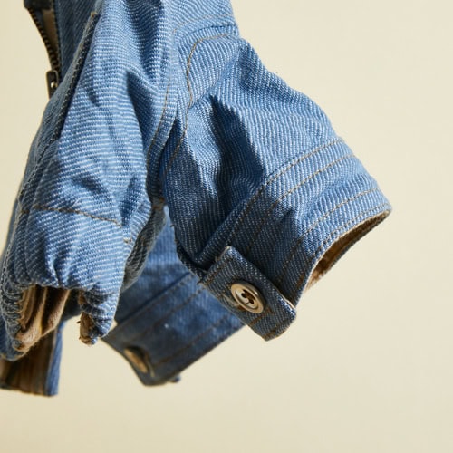 Soft denim dog jacket designed for comfort and style, perfect for stylish pet fashion accessories.
