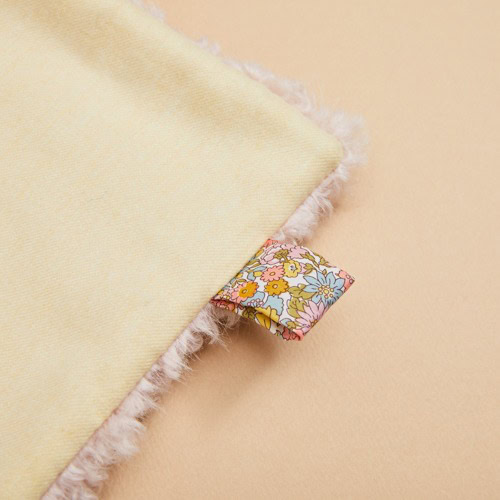 The Butter Glow Peekaboo Fur Blanket by Louisdog