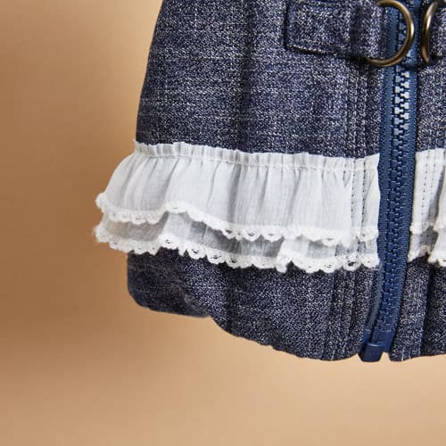 Cute denim dog jacket with ruffle trim and lace detailing, perfect for fashionable pet apparel and cozy pet clothing for small dogs.