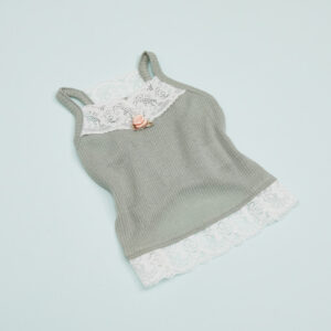 A cute gray pet dress with lace details and a small pink rose embellishment, perfect for fashionable small dogs or cats.