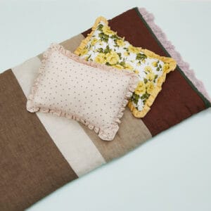 Louisdog Little Mellow Pillow styled on a luxury dog bed