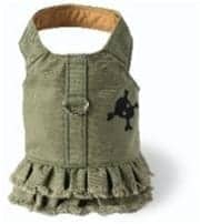 Soft olive green dog harness with ruffled trim and black skull embroidery, perfect for fashionable pets.