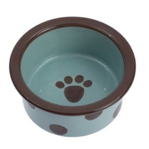 Portable dog bowl with paw print design, ideal for travel and outdoor use, made from durable materials to keep your pet hydrated on the go. Perfect for small to medium-sized dogs.