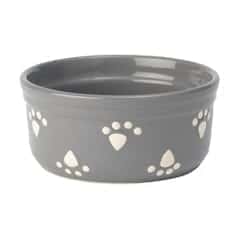 Pet food bowl with paw print design, ceramic dish for dogs and cats, durable and stylish pet feeding accessory.