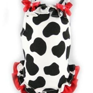 Cute cow print dog dress with red ruffle trim and bow details, perfect for fashionable pet costumes and boutique pet apparel.