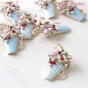 Miniature cupcake charm with colorful rhinestones, perfect for pet lovers' jewelry and accessories on Paws With Fashion.