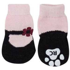 Adorable pink and black pet sock set featuring paw print designs and a cute flower embellishment, perfect for pet fashion and gifting.