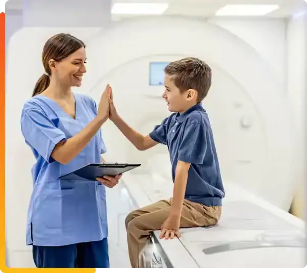 Nurse-Giving-Child-High-Five-Near-MRI-Machine