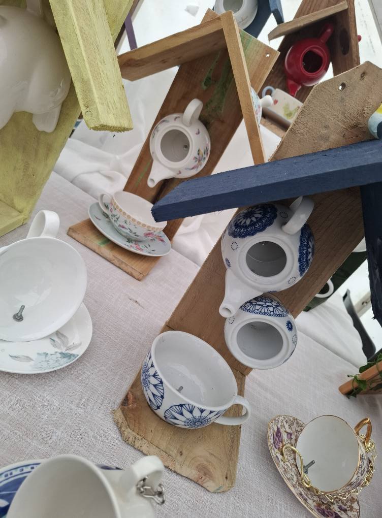 Decorative upcycled teacup bird feeders for gardens and patios.