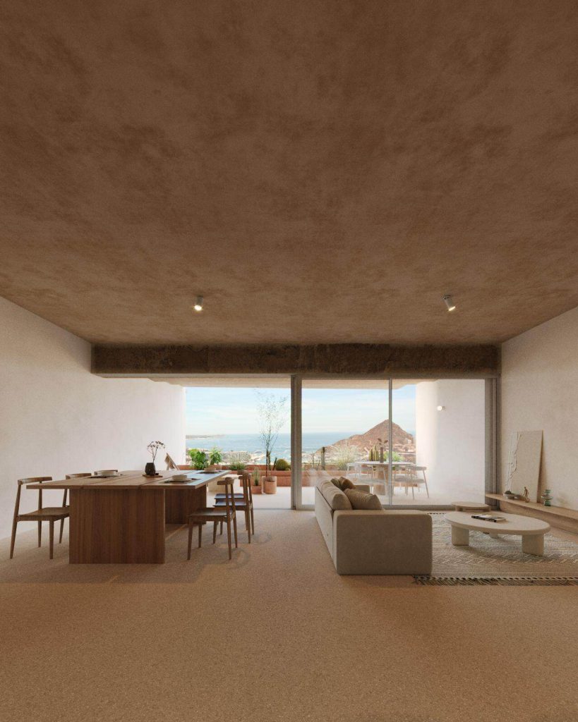 10 Hidden Pedregal Luxury Villas In Cabo You Must See β Homes For Sale In Pedregal Modern Pedregal Living Room With Spacious Open-Concept Design, Large Glass Sliding Doors Overlooking Scenic Ocean And Mountain Views, Neutral Tones, Minimalist Furniture, And Natural Light.