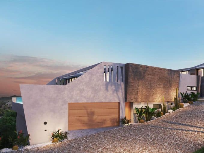 Modern Pedregal Luxury Home With Sleek Architecture And Native Stone Accents At Sunset, Showcasing Contemporary Design And Hillside Views.