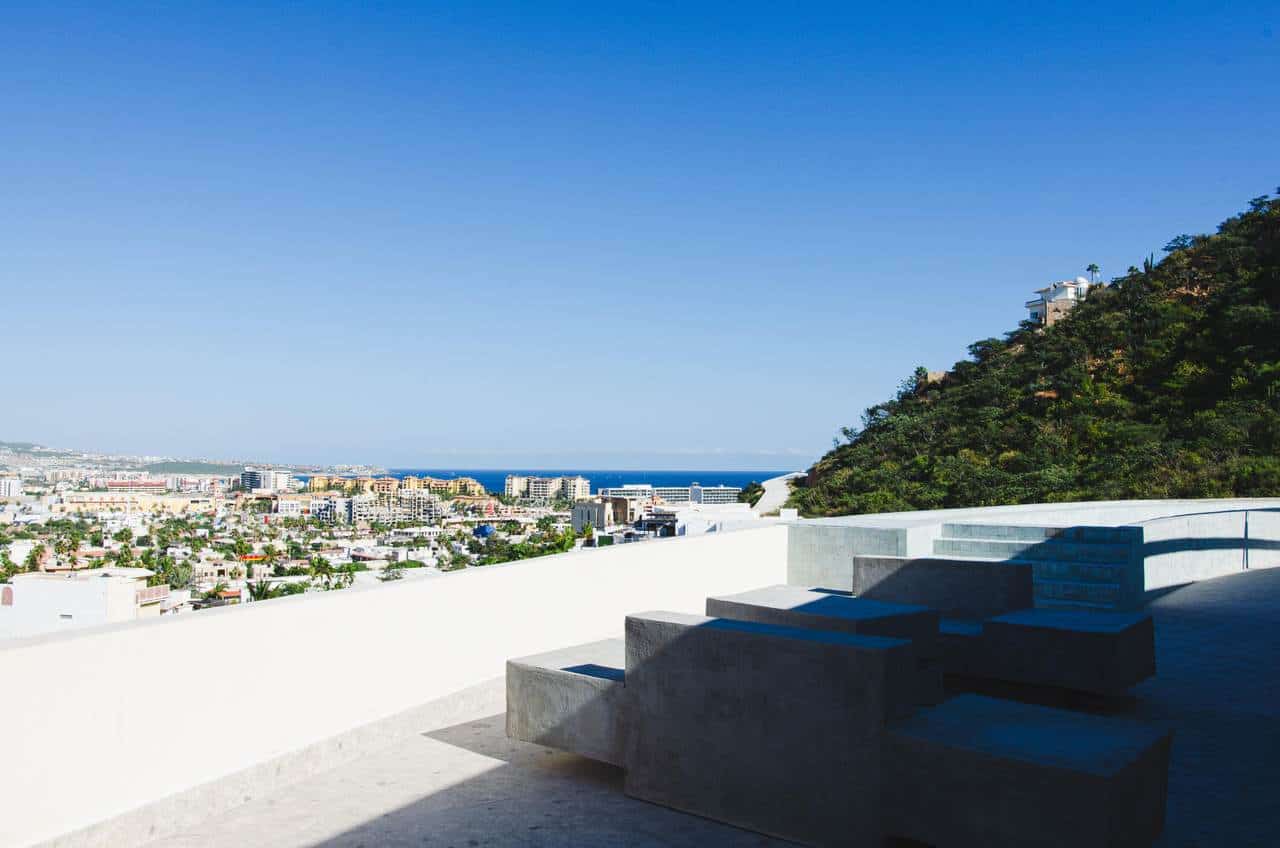 Pedregal Hillside Home With Stunning Ocean Views And Modern Outdoor Seating.