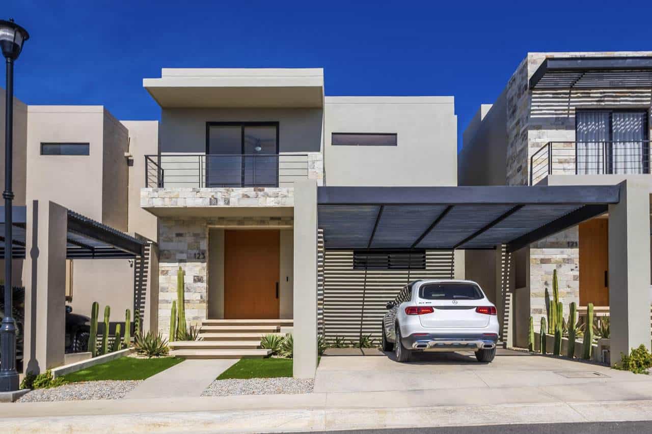 Pedregal Modern Hillside Home With Sleek Design And Spacious Driveway.