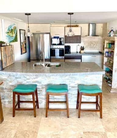 Pedregal Modern Kitchen With Island And Colorful Bar Stools.