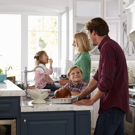 Family In Kitchen
