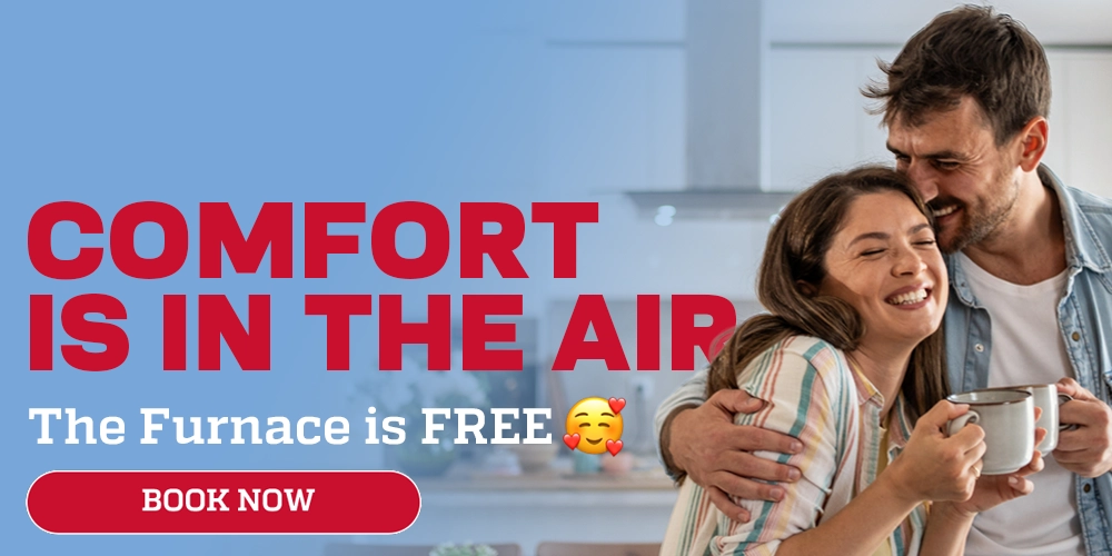 A Smiling Couple Hugs In A Kitchen, Holding Mugs. Large Red Text Reads, &Quot;Comfort Is In The Air.&Quot; Smaller Text Says, &Quot;The Furnace Is Free,&Quot; With A &Quot;Book Now&Quot; Button Below.