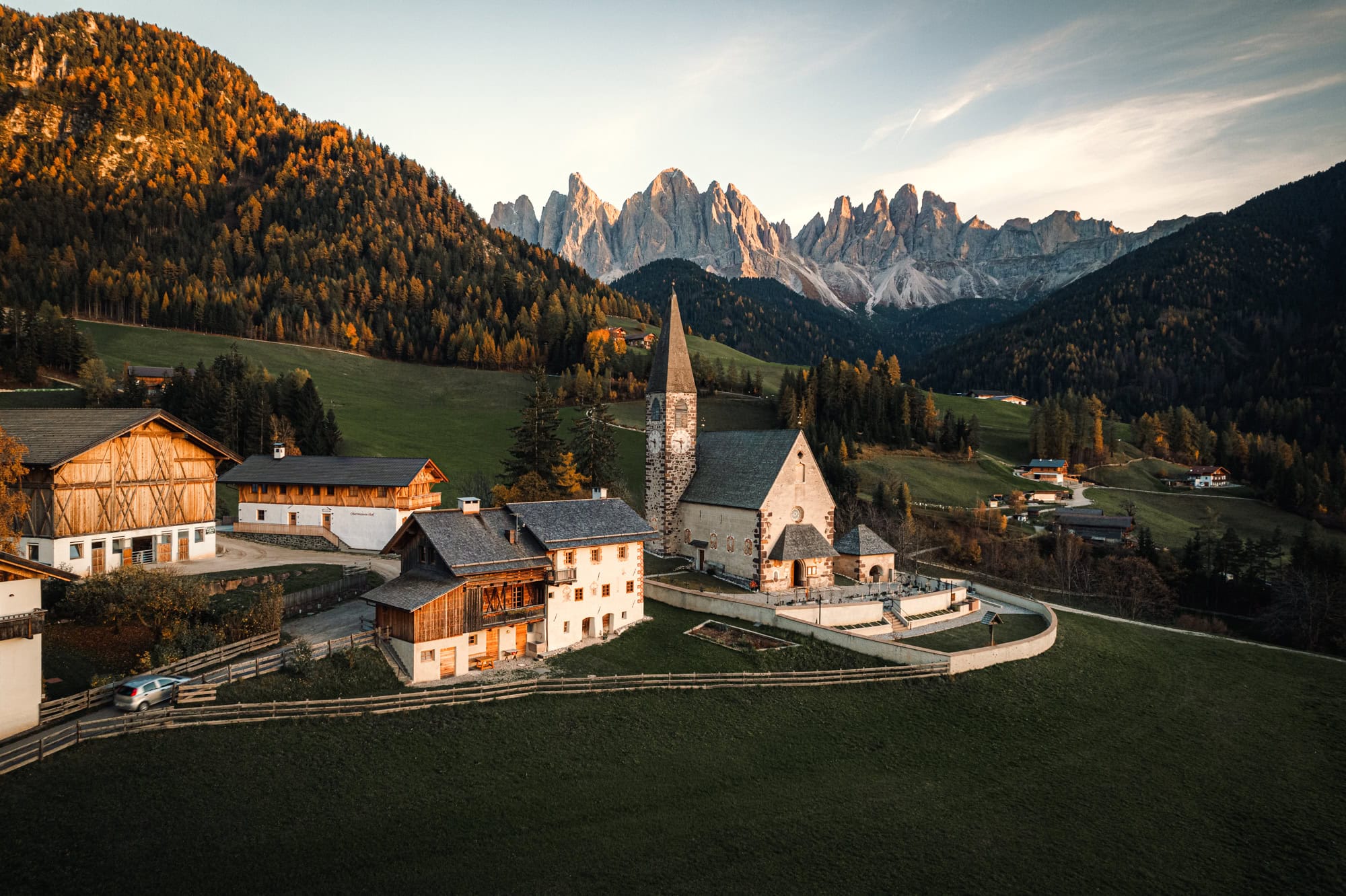 church in italy with mountain backdrop