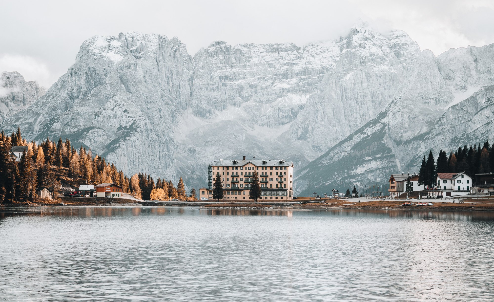 House surrounded by Nature mountain and lake