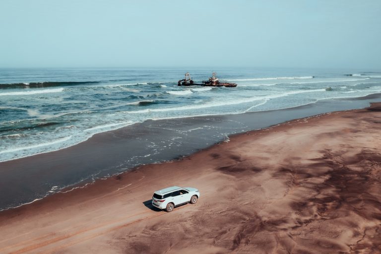 Driving a car on the beach in Skeleton Coast