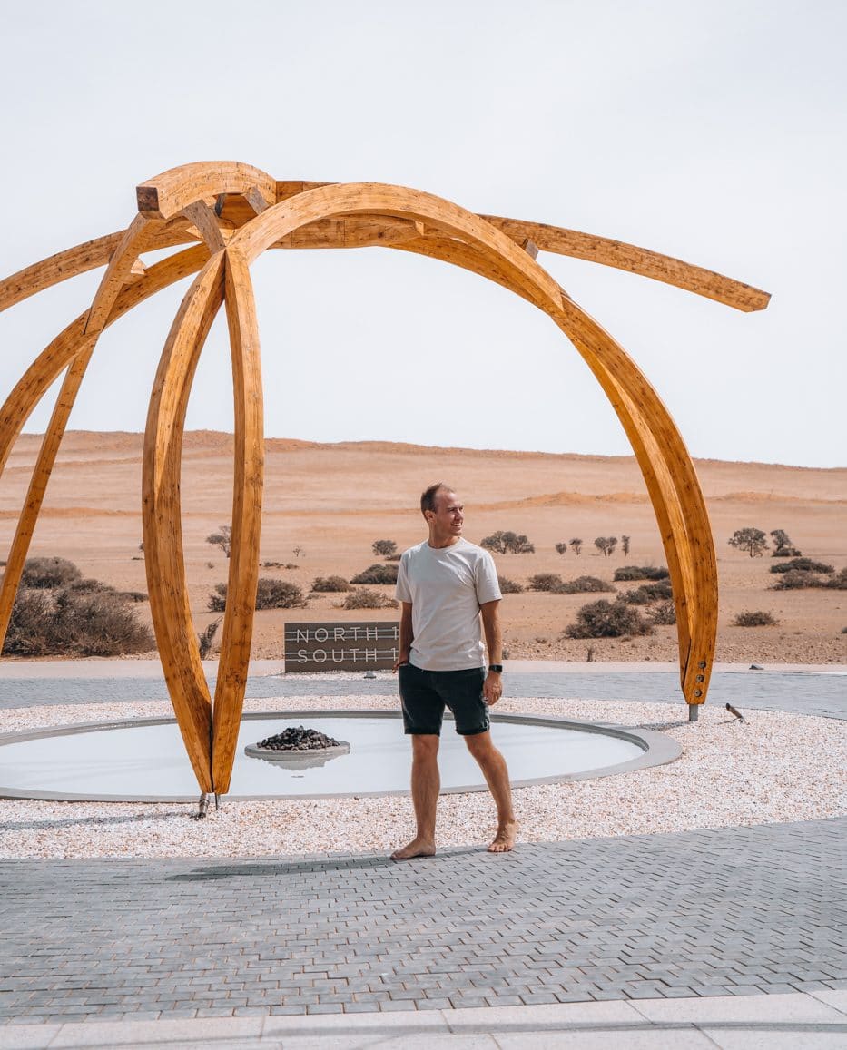 Person standing in a common area of a desert lodge in Namibia