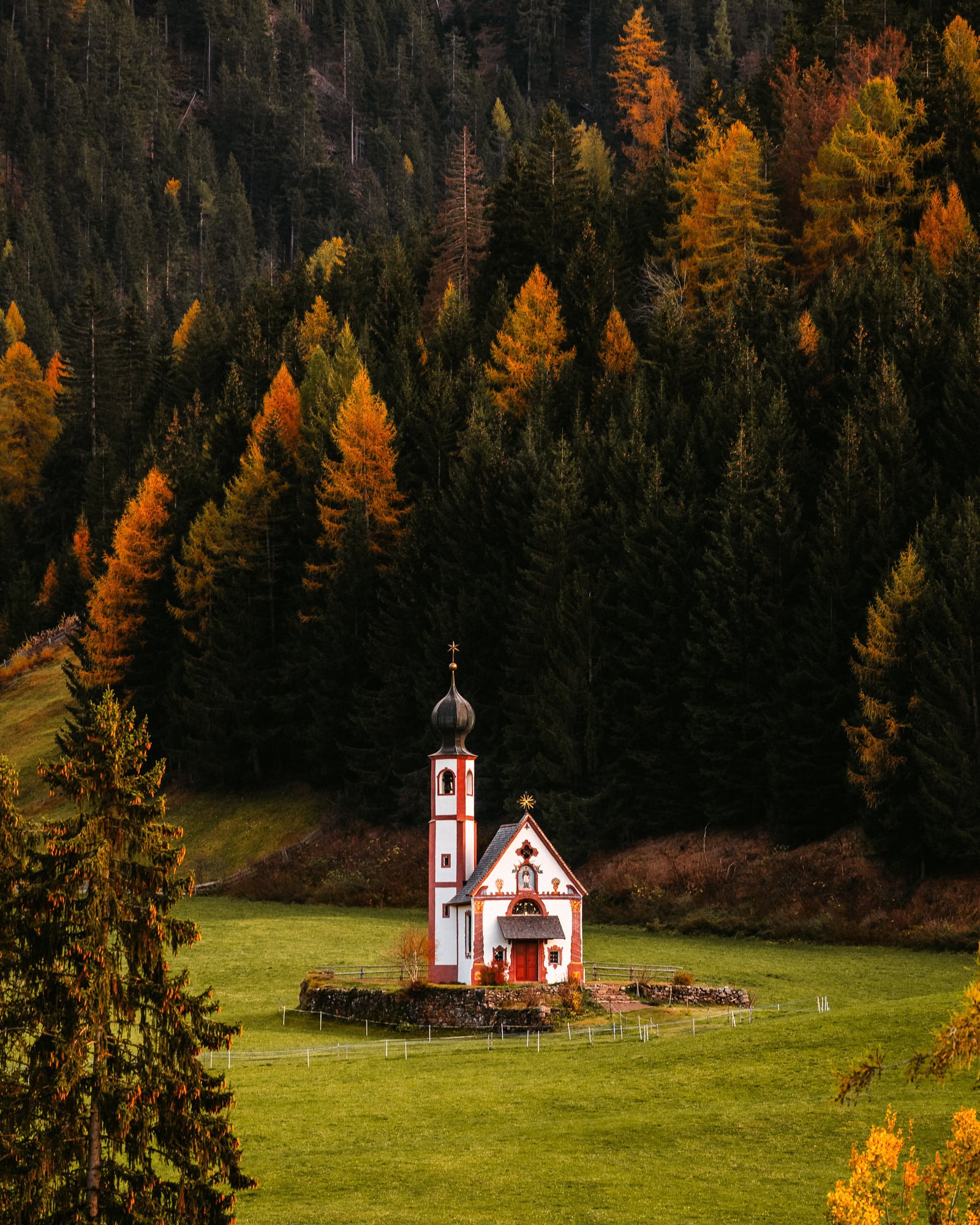 Small church in Italian Dolomites during Autumn season