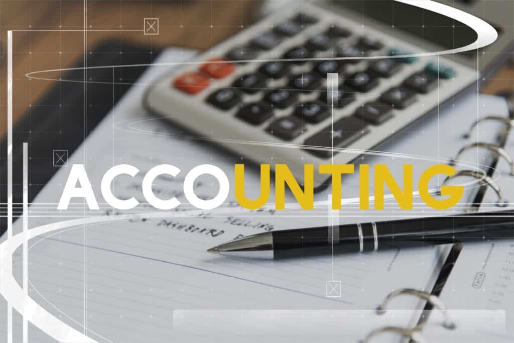 Accounting calculator and pen on financial documents for bookkeeping services.