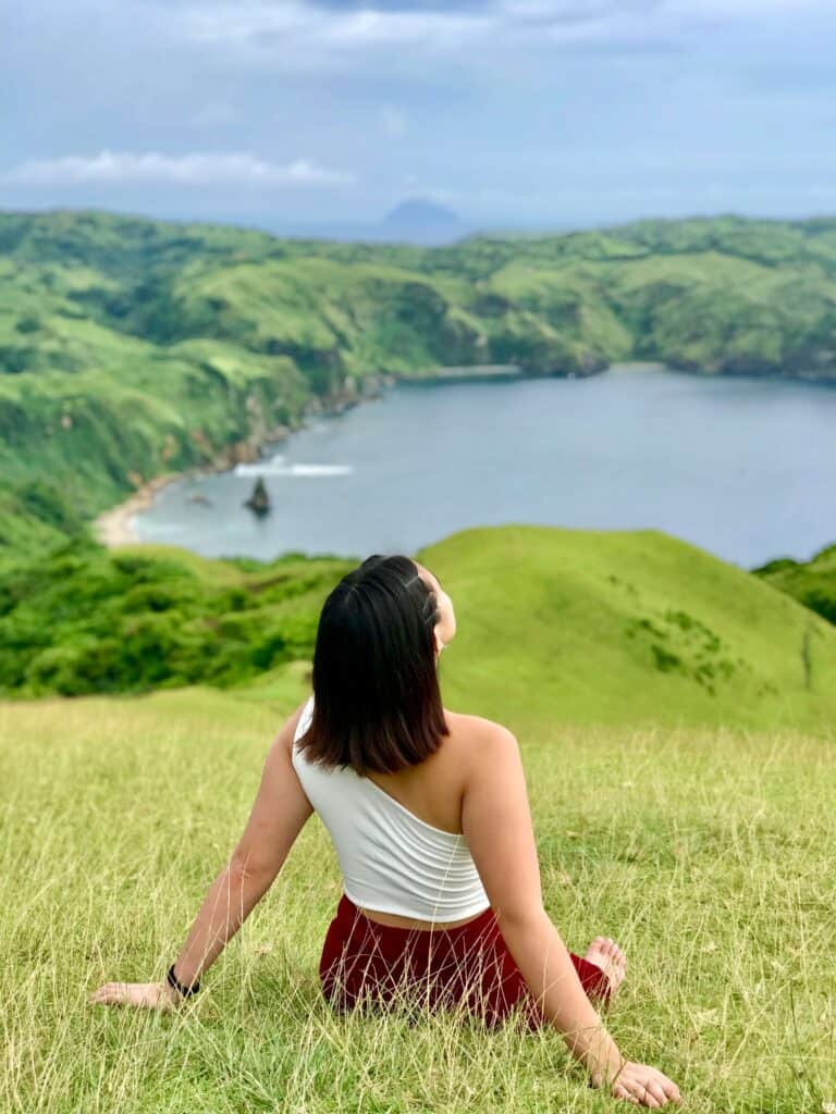 Rachel Bomogao Obo-ob taking in the coastal landscape of Batanes