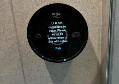 Shower control display indicating valve connection needed.