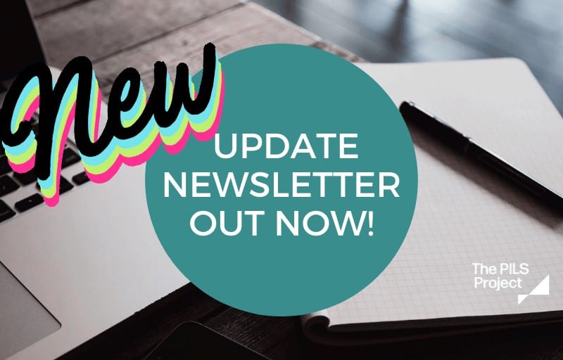 The image shows a work desk, with a laptop, notepad and pen spread out across it. The text written on top of the image says 'Update newsletter out now!' and there's an animated 'New' flashing in the top right-hand corner, like a neon sign.