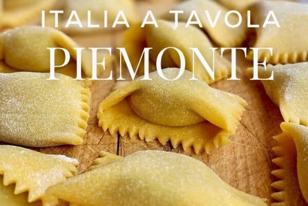 Fresh homemade pasta on a wooden surface with text overlay.