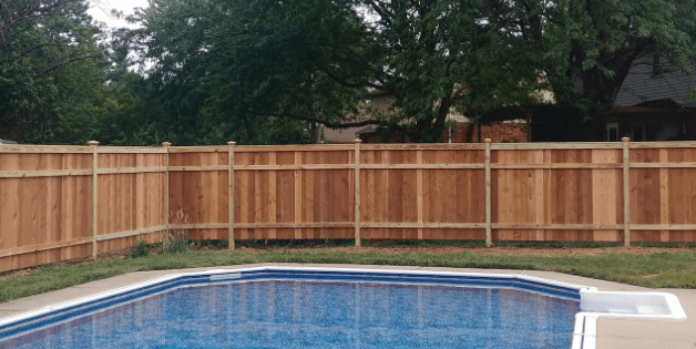 Tall wooden privacy fence Tall wooden privacy fence