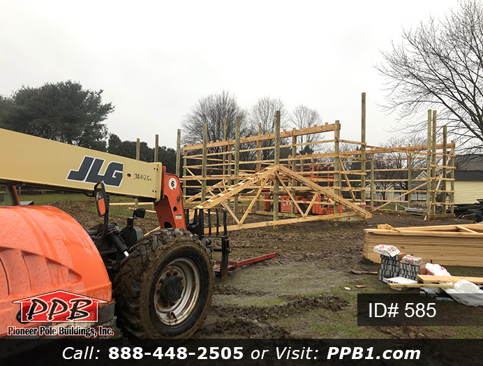 585 – Residential Nice Size Garage with Lean-To 30x40x12 13 Pole Building Dimensions: 30’ W x 40’ L x 12’ 4” H (ID# 585) A Nice Size Garage with Lean-To 30’ Standard Trusses, 2’ on Center 5/12 Pitch Colors: Siding Color: Clay Roofing Color: Weathered Wood (Architectural Shingles) Trim Color: White