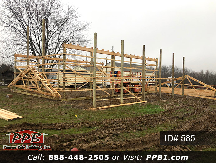 585 – Residential Nice Size Garage with Lean-To 30x40x12 12 Pole Building Dimensions: 30’ W x 40’ L x 12’ 4” H (ID# 585) A Nice Size Garage with Lean-To 30’ Standard Trusses, 2’ on Center 5/12 Pitch Colors: Siding Color: Clay Roofing Color: Weathered Wood (Architectural Shingles) Trim Color: White
