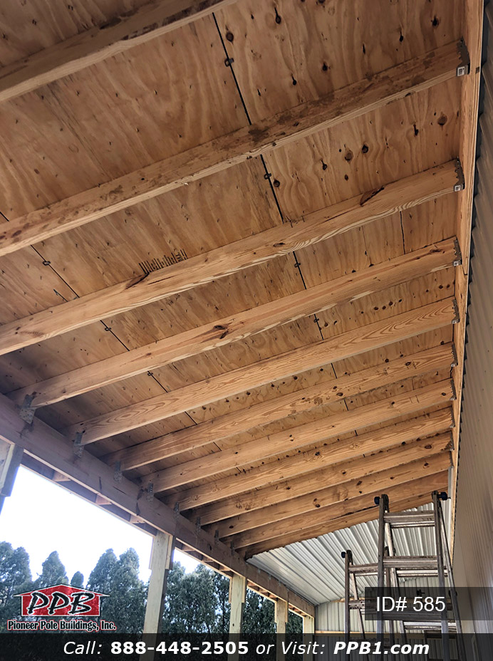 585 – Residential Nice Size Garage with Lean-To 30x40x12 7 Pole Building Dimensions: 30’ W x 40’ L x 12’ 4” H (ID# 585) A Nice Size Garage with Lean-To 30’ Standard Trusses, 2’ on Center 5/12 Pitch Colors: Siding Color: Clay Roofing Color: Weathered Wood (Architectural Shingles) Trim Color: White