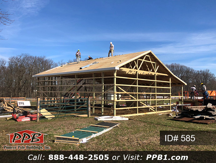 585 – Residential Nice Size Garage with Lean-To 30x40x12 10 Pole Building Dimensions: 30’ W x 40’ L x 12’ 4” H (ID# 585) A Nice Size Garage with Lean-To 30’ Standard Trusses, 2’ on Center 5/12 Pitch Colors: Siding Color: Clay Roofing Color: Weathered Wood (Architectural Shingles) Trim Color: White