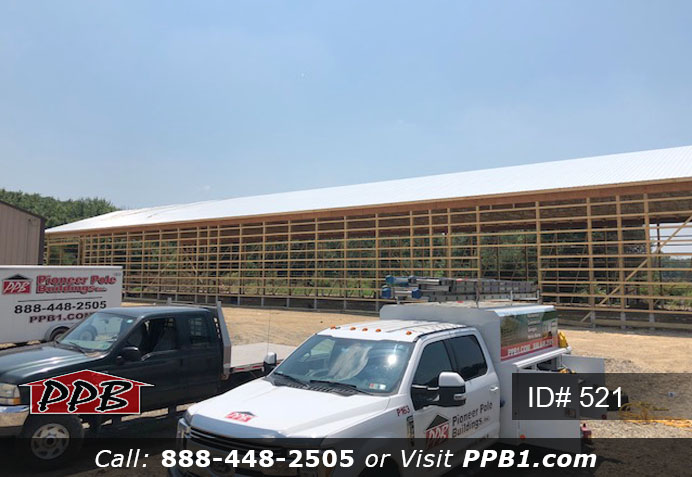 Pole Building Dimensions: 60’ W x 200’ L x 20’ 6” H (ID# 521) Big Blue Machine Shop 60’ Standard Trusses, 4’ on Center 4/12 Pitch Colors: Siding Color: Ocean Blue Roofing Color: Brite White Trim Color: Brite White Openings: (1) 20’ x 16’ Hi-Lift Commercial Garage Door (2) 10’ x 10’ Hi-Lift Commercial Garage Doors (6) 3068 6-Panel Insulated Entry Doors (1) 3068 9-Lite Insulated Entry Door (7) 3’ x 4’ Single-Hung Windows with Screens, Color: White 
