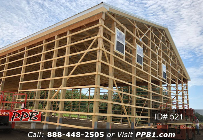 Pole Building Dimensions: 60’ W x 200’ L x 20’ 6” H (ID# 521) Big Blue Machine Shop 60’ Standard Trusses, 4’ on Center 4/12 Pitch Colors: Siding Color: Ocean Blue Roofing Color: Brite White Trim Color: Brite White Openings: (1) 20’ x 16’ Hi-Lift Commercial Garage Door (2) 10’ x 10’ Hi-Lift Commercial Garage Doors (6) 3068 6-Panel Insulated Entry Doors (1) 3068 9-Lite Insulated Entry Door (7) 3’ x 4’ Single-Hung Windows with Screens, Color: White 