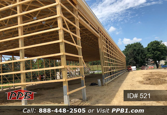 Pole Building Dimensions: 60’ W x 200’ L x 20’ 6” H (ID# 521) Big Blue Machine Shop 60’ Standard Trusses, 4’ on Center 4/12 Pitch Colors: Siding Color: Ocean Blue Roofing Color: Brite White Trim Color: Brite White Openings: (1) 20’ x 16’ Hi-Lift Commercial Garage Door (2) 10’ x 10’ Hi-Lift Commercial Garage Doors (6) 3068 6-Panel Insulated Entry Doors (1) 3068 9-Lite Insulated Entry Door (7) 3’ x 4’ Single-Hung Windows with Screens, Color: White 