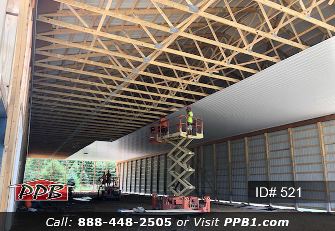 Pole Building Dimensions: 60’ W x 200’ L x 20’ 6” H (ID# 521) Big Blue Machine Shop 60’ Standard Trusses, 4’ on Center 4/12 Pitch Colors: Siding Color: Ocean Blue Roofing Color: Brite White Trim Color: Brite White Openings: (1) 20’ x 16’ Hi-Lift Commercial Garage Door (2) 10’ x 10’ Hi-Lift Commercial Garage Doors (6) 3068 6-Panel Insulated Entry Doors (1) 3068 9-Lite Insulated Entry Door (7) 3’ x 4’ Single-Hung Windows with Screens, Color: White 