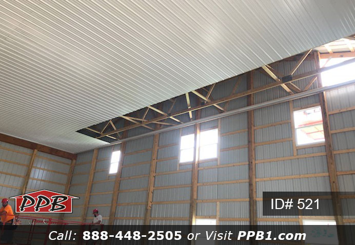 Pole Building Dimensions: 60’ W x 200’ L x 20’ 6” H (ID# 521) Big Blue Machine Shop 60’ Standard Trusses, 4’ on Center 4/12 Pitch Colors: Siding Color: Ocean Blue Roofing Color: Brite White Trim Color: Brite White Openings: (1) 20’ x 16’ Hi-Lift Commercial Garage Door (2) 10’ x 10’ Hi-Lift Commercial Garage Doors (6) 3068 6-Panel Insulated Entry Doors (1) 3068 9-Lite Insulated Entry Door (7) 3’ x 4’ Single-Hung Windows with Screens, Color: White 