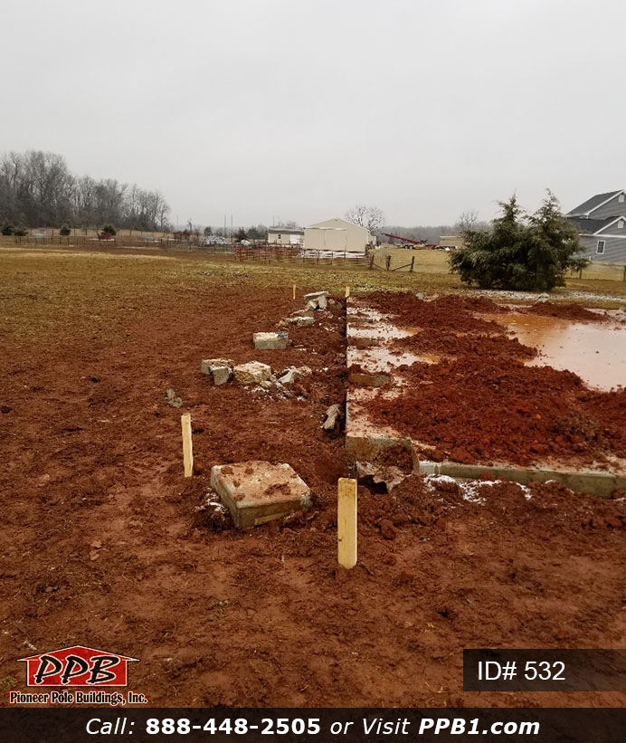 Pole Building Dimensions: 40’ W x 60’ L x 16’ 4” H (ID# 532) 40’ Standard Trusses, 4’ on Center 4/12 Pitch Colors: Two-Tone Siding Color: Upper Color: Slate Lower Color: Charcoal Roofing Color: Charcoal Trim Color: Brite White