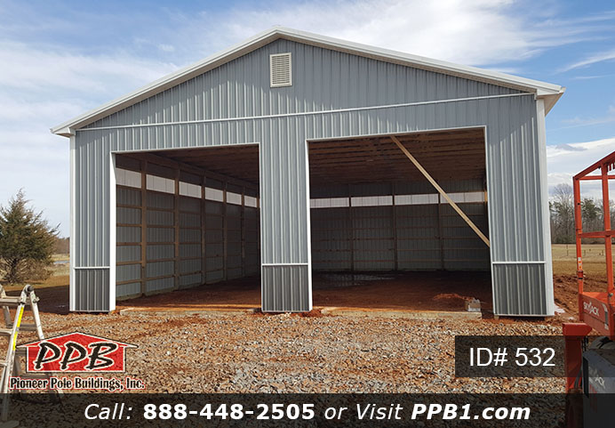 Pole Building Dimensions: 40’ W x 60’ L x 16’ 4” H (ID# 532) 40’ Standard Trusses, 4’ on Center 4/12 Pitch Colors: Two-Tone Siding Color: Upper Color: Slate Lower Color: Charcoal Roofing Color: Charcoal Trim Color: Brite White