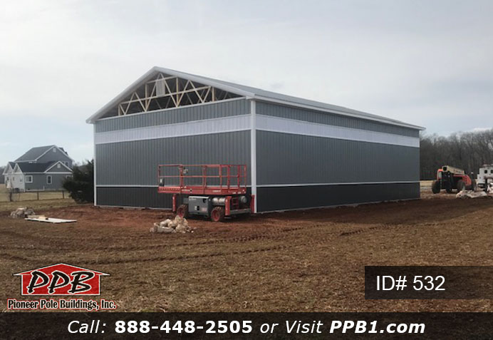 Pole Building Dimensions: 40’ W x 60’ L x 16’ 4” H (ID# 532) 40’ Standard Trusses, 4’ on Center 4/12 Pitch Colors: Two-Tone Siding Color: Upper Color: Slate Lower Color: Charcoal Roofing Color: Charcoal Trim Color: Brite White
