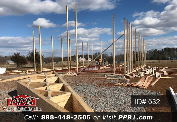 Pole Building Dimensions: 40’ W x 60’ L x 16’ 4” H (ID# 532) 40’ Standard Trusses, 4’ on Center 4/12 Pitch Colors: Two-Tone Siding Color: Upper Color: Slate Lower Color: Charcoal Roofing Color: Charcoal Trim Color: Brite White