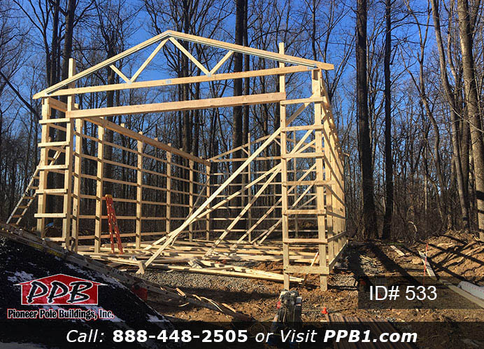 Pole Building Dimensions: 24’ W x 40’ L x 14’ 4” H (ID# 533) 24’ Standard Trusses, 4’ on Center 4/12 Pitch Colors: Siding Color: Brown Roofing Color: Clay Trim Color: Light Stone Openings: (1) 18” x 12” Residential Premium Garage Door with (4) Windows (1) 3068 9-Lite Insulated Entry Door (2) 3’ x 4’ Single-Hung Insulated Windows with Screens & Grids (1) Ceiling Access Door, Color: Bright White