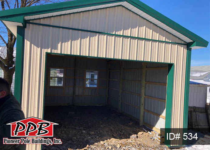 Pole Building Dimensions: 16’ W x 24’ L x 10’ 4” H 16’ Standard Trusses, 4’ on Center, 4/12 Pitch Colors: Siding Color: Beige Roofing Color: Ivy (Green) Trim Color: Ivy (Green) Openings: (1) 12’ x 8’ Residential Garage Door (2) 3’ x 4’ Single Hung Insulated Windows with Screens & Grids (1) 3068 6-Panel Entry Door