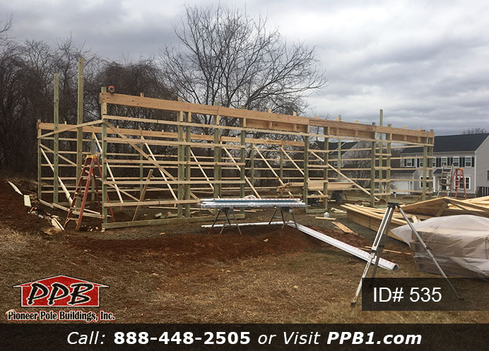 Pole Building Dimensions: 30’ W x 56’ L x 12’ 4” H (ID# 535) 30’ Standard Trusses, 4’ on Center 4/12 Pitch Colors: Siding Color: Sterling Gray (Vinyl Siding) Roofing Color: Black Trim Color: White & Black Openings: (3) 10’ x 8’ Residential Classic Garage Doors with (5) Windows & Hi-Lift (1) 3068 6-Panel Insulated Entry Door (3) 3’ x 4’ Single-Hung Insulated Windows with Screens & Grids
