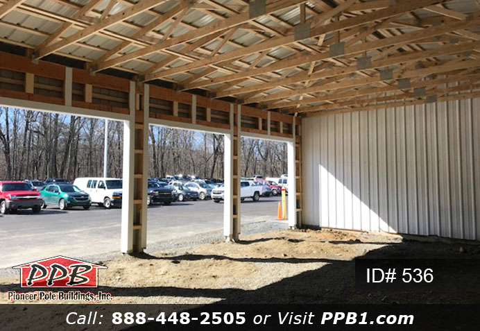 Pole Building Dimensions: 32’ W x 48’ L x 14’ 6” H (ID# 536) 32’ Standard Trusses, 4’ on Center 4/12 Pitch Colors: Siding Color: White Roofing Color: White Trim Color: White