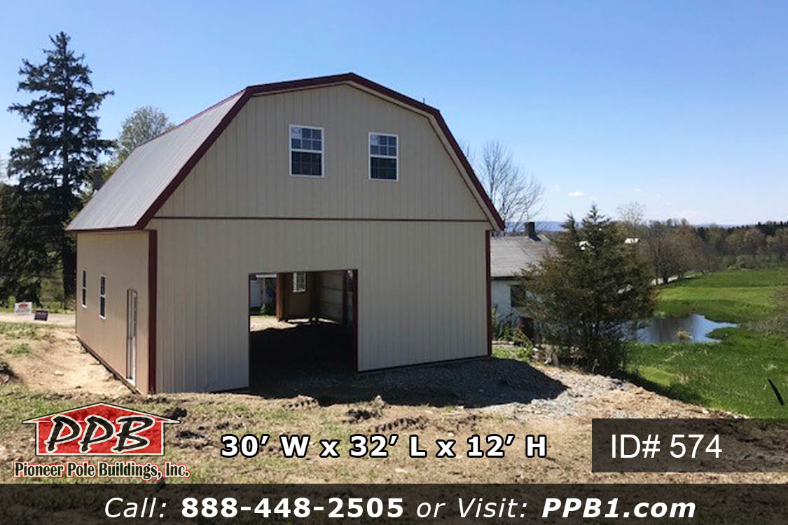 30’ W x 32’ L x 12’ H A Gambrel Garage with a Second Floor 30’ Gambrel Trusses, 2’ on Center Colors: Siding Color: Beige Roofing Color: Ash Gray Trim Color: Red