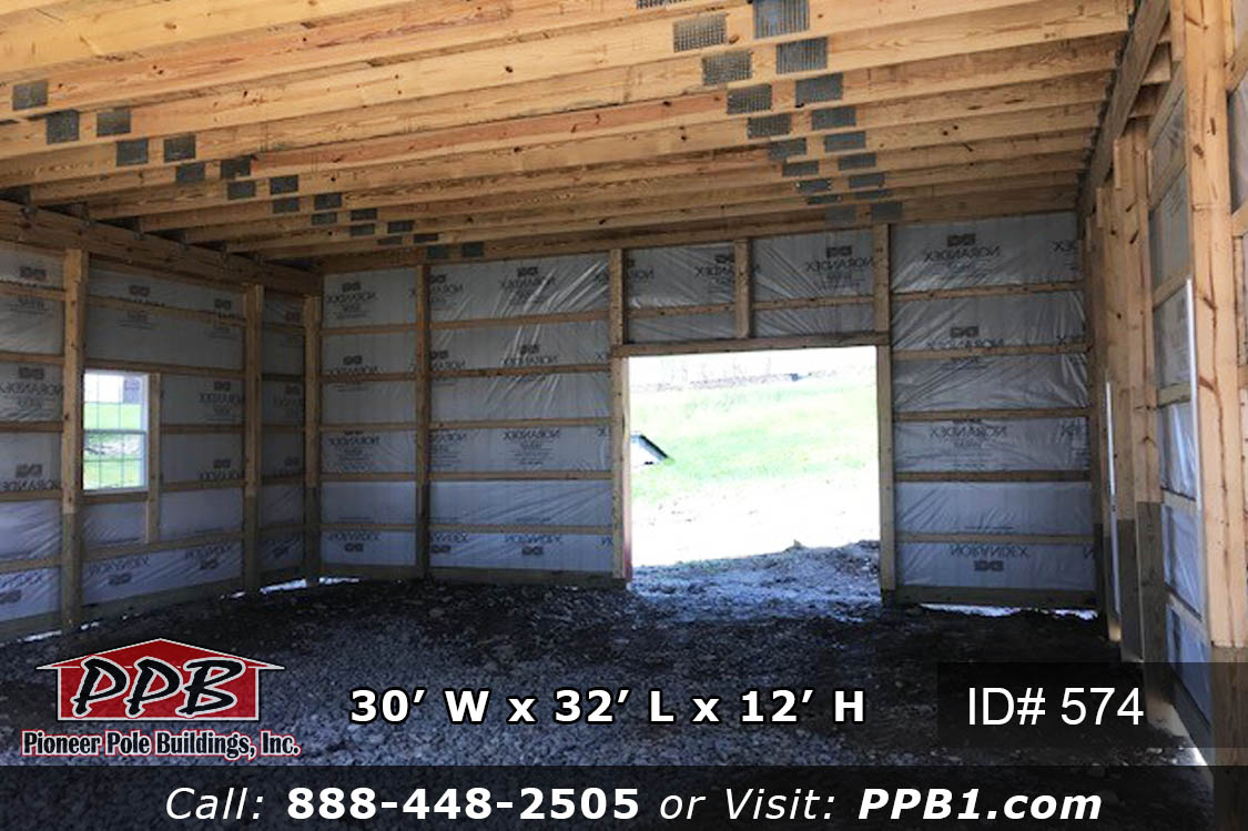 30’ W x 32’ L x 12’ H A Gambrel Garage with a Second Floor 30’ Gambrel Trusses, 2’ on Center Colors: Siding Color: Beige Roofing Color: Ash Gray Trim Color: Red